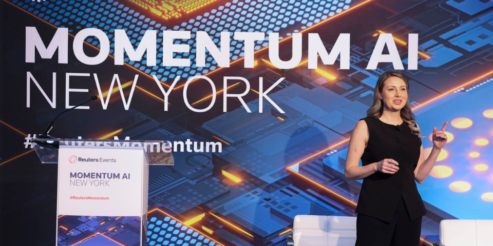 Meaghan on stage at momentum AI New York